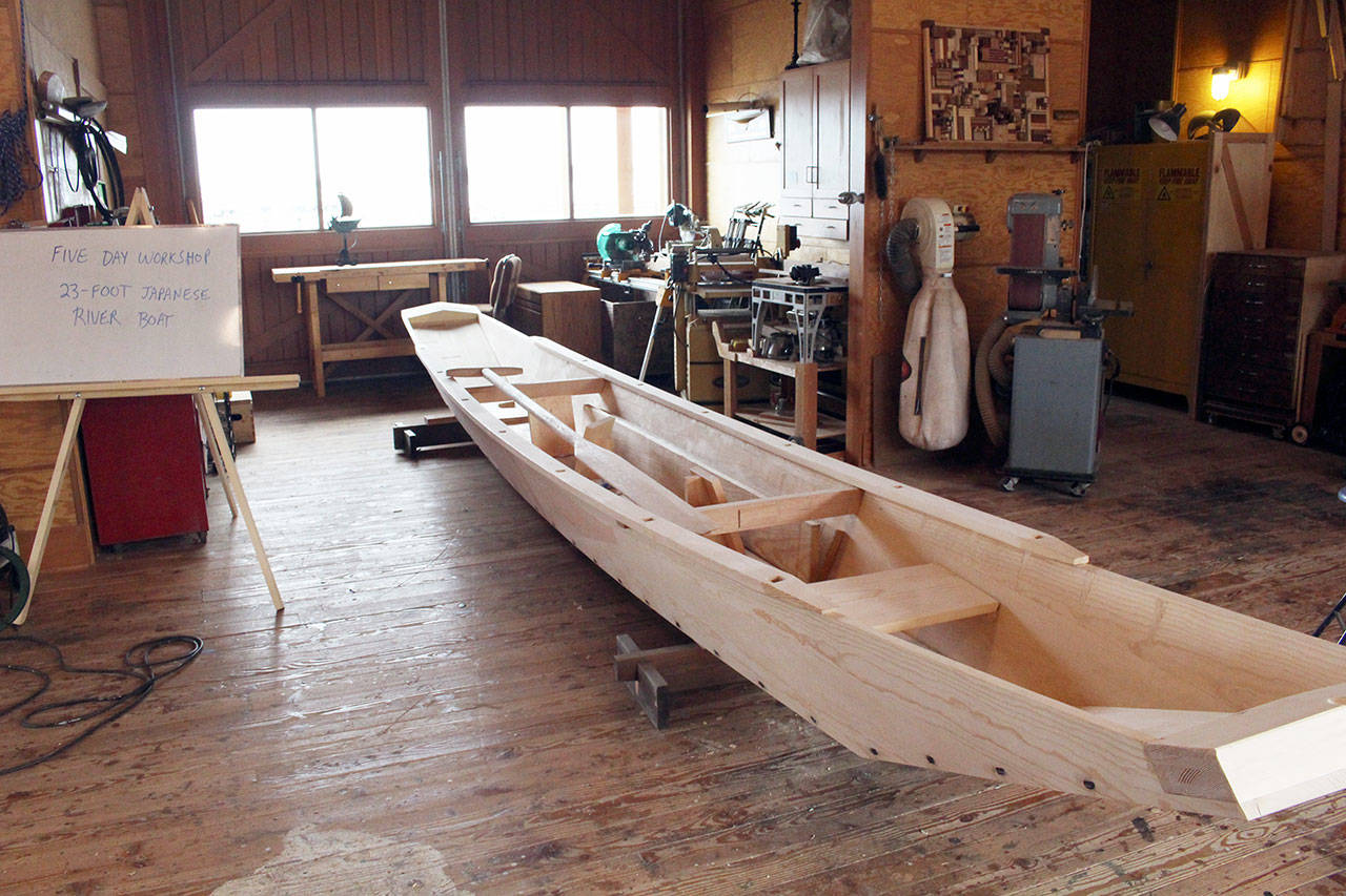A 23-foot long Shinano River boat that was built over the course of a five-day workshop at the Port Townsend Maritime Center will have its official launch at the Wooden Boat Festival this weekend. (Zach Jablonski/Peninsula Daily News)