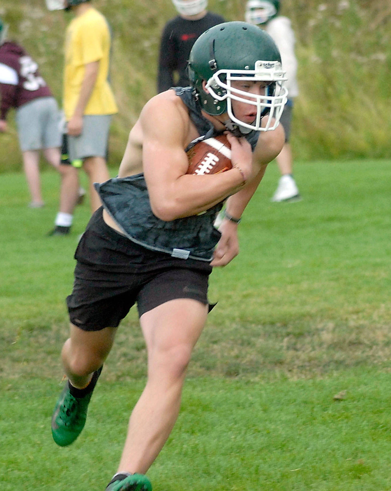Keith Thorpe/Peninsula Daily News Port Angeles running back Daniel Cable suffered a torn ACL in his right knee last season but is back with the Roughriders.