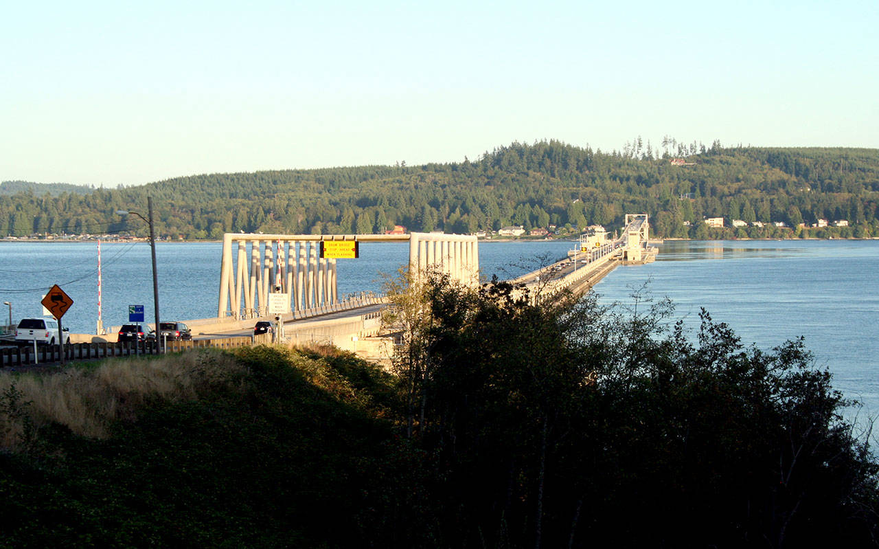 Traffic crosses the Hood Canal Bridge along state Highway 104 on Wednesday evening. The Peninsula Regional Transportation Planning Organization is examining all modes of transit in its 2040 draft plan, which is open for public comment through Oct. 18. (Brian McLean/Peninsula Daily News)