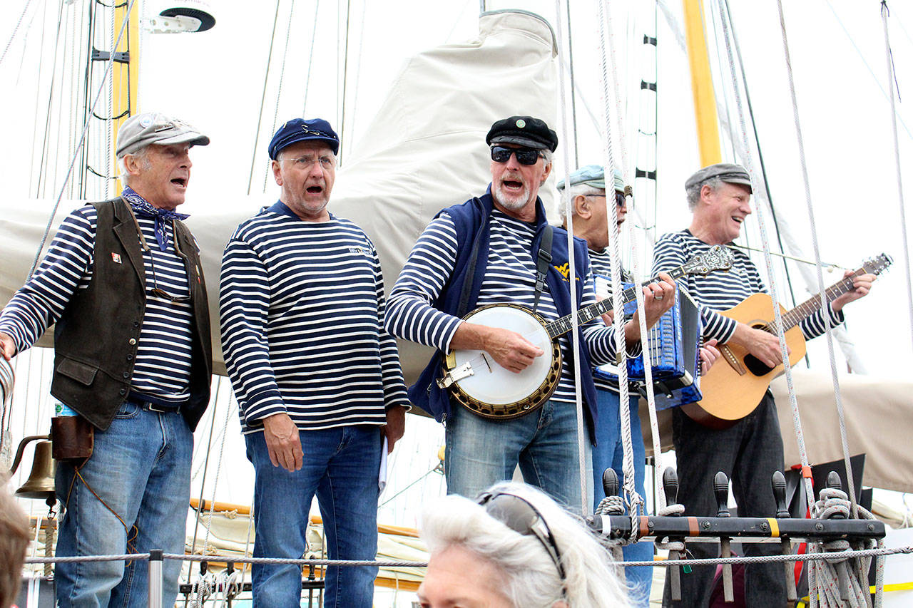 The Shifty Sailors perform on the boat Suva on Saturday at the Wooden Boat Festival in Port Townsend. (Zach Jablonski/Peninsula Daily News)