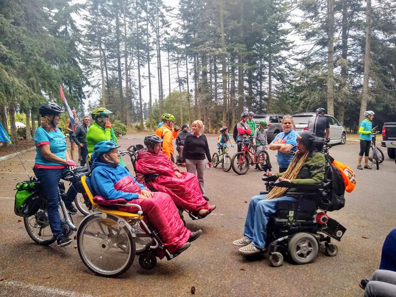 Volunteers with the Sequim Wheelers group meet with Ian Mackay of Agnew during his three-day Sea to Sound journey in August. (Sequim Wheelers)