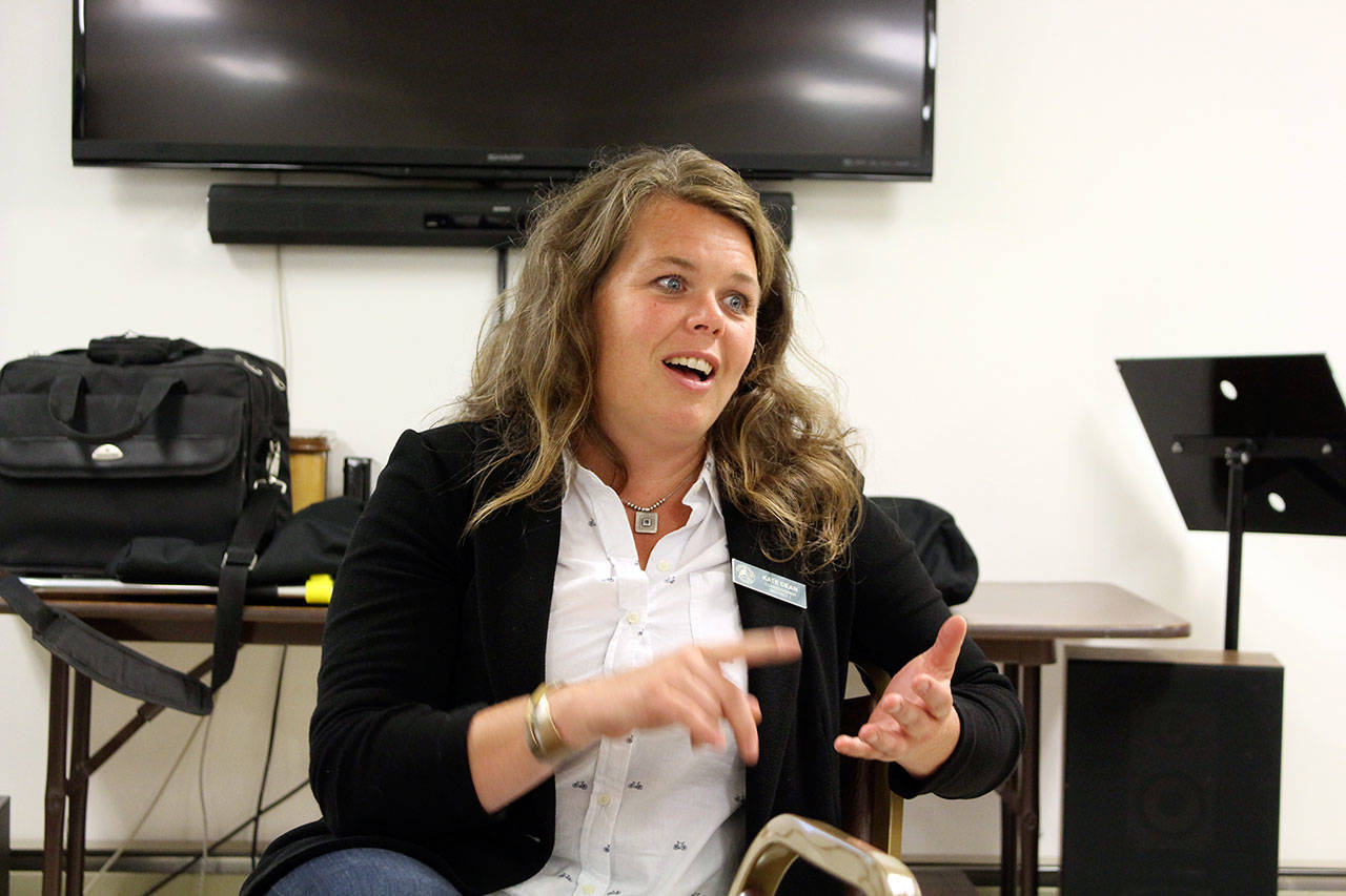 Jefferson County commissioners Chair Kate Dean answers questions while at the Brinnon community outreach meeting at the Brinnon Community Center. (Zach Jablonski/Peninsula Daily News)