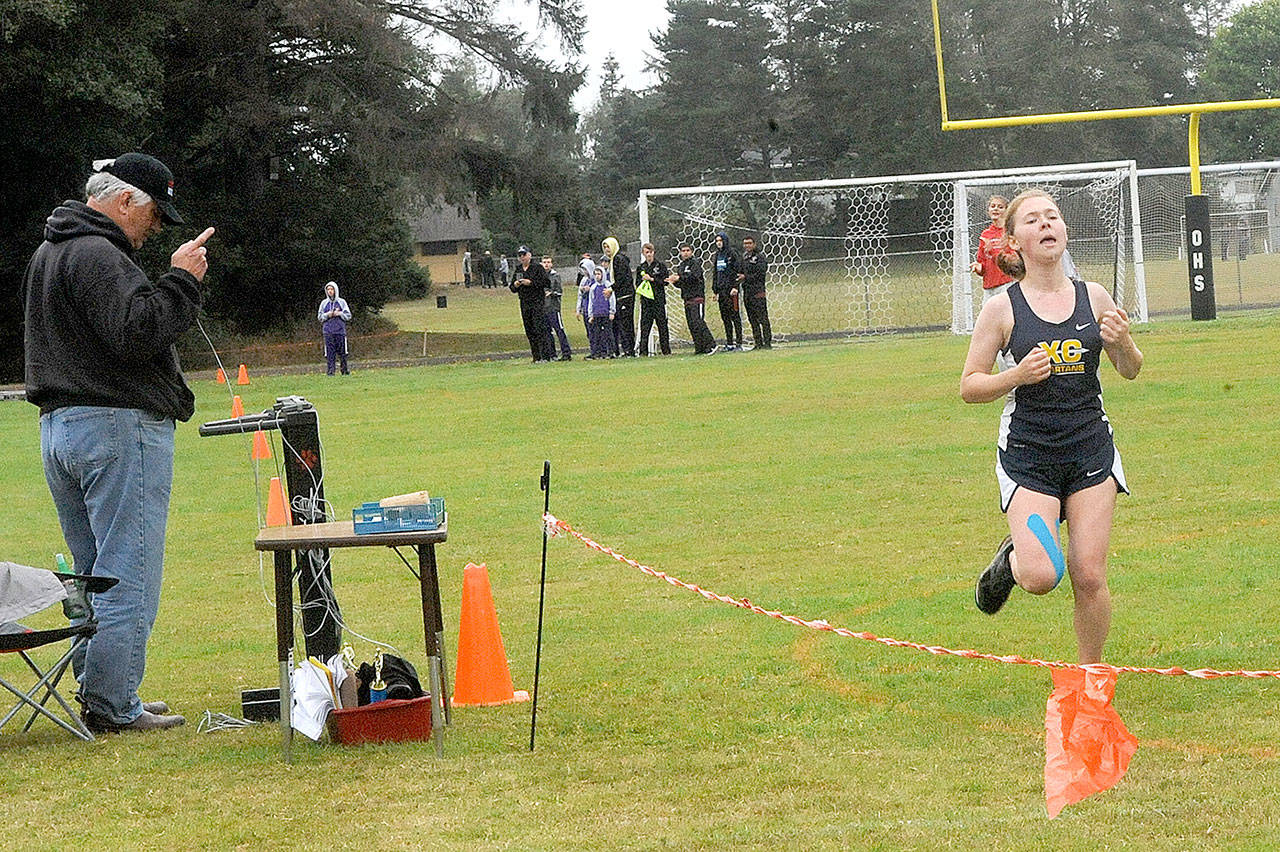 Madelyn Archibald of Forks wins the girls’ Ocosta Invitational cross-country race on Saturday.