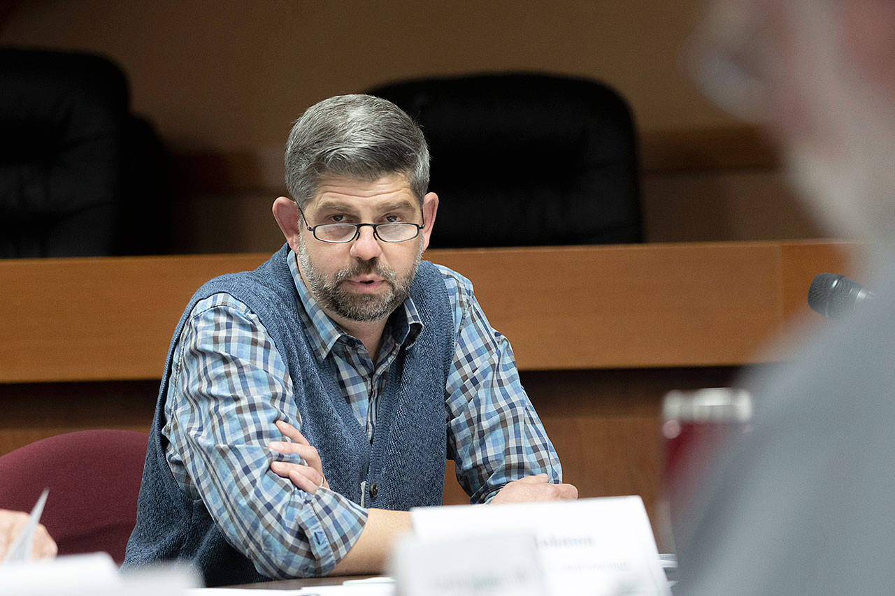 Clallam County Commissioner Mark Ozias suggested to the Board of Health on Tuesday that it should postpone making a decision on a proposed $13 per year fee for septic system owners that would fund the state-mandated on-site septic program. (Jesse Major/Peninsula Daily News)
