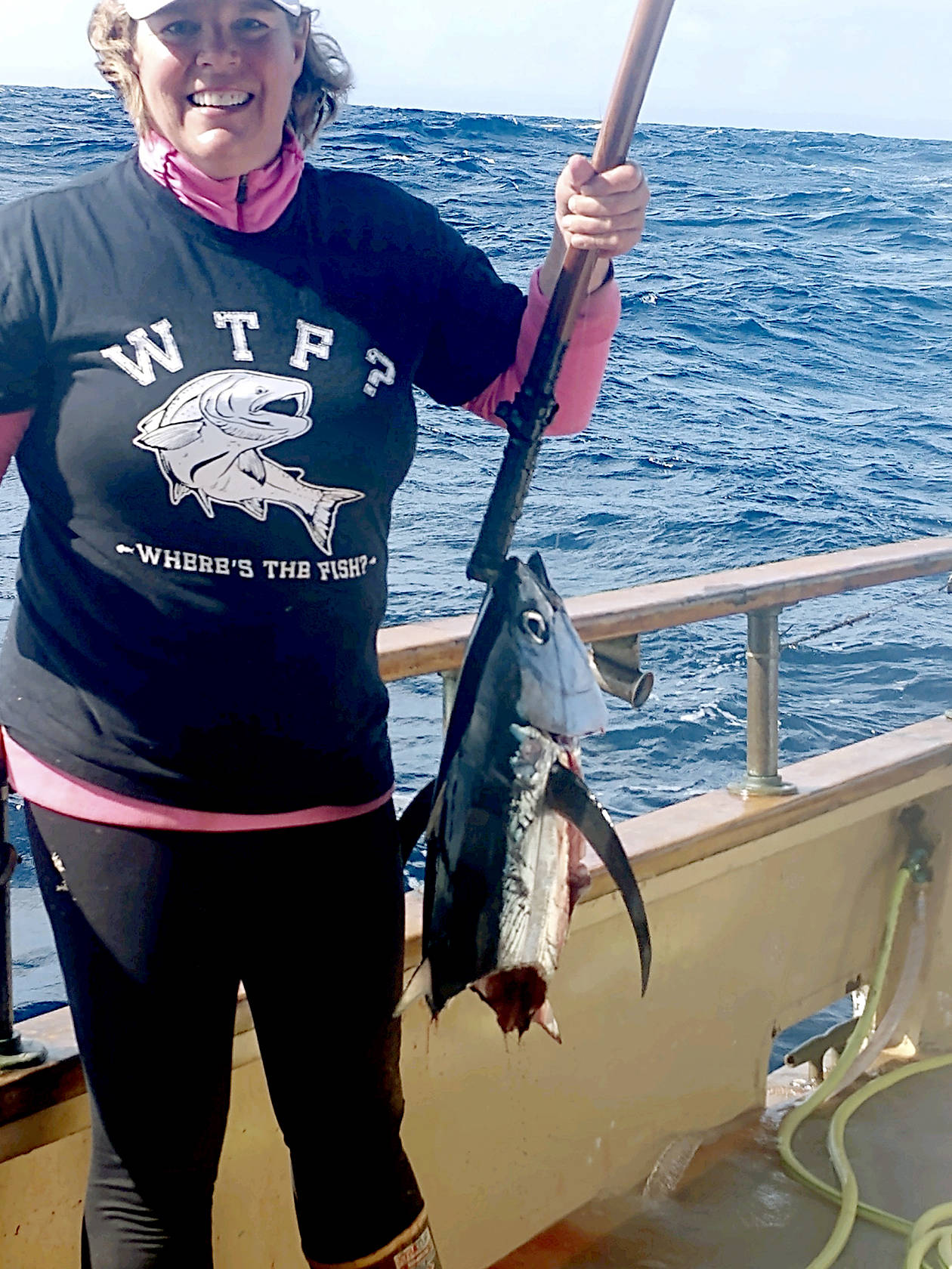 Port Townsend’s Brenda Burke fished for tuna 55 miles off of Westport with nine friends last week. The group caught 220 albacore tuna. Burke said the catch would have been 221 but a blue shark decided it wanted a meal.