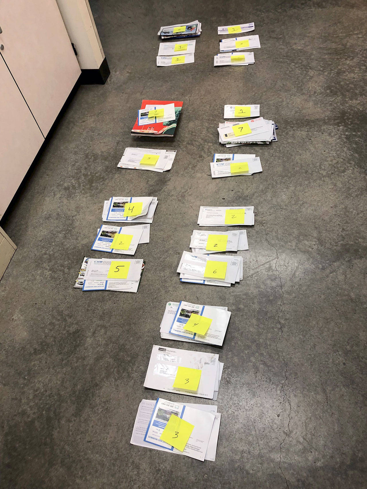 The Jefferson County Sheriff’s Office said these mail items were to be returned to the U.S. Post Office after they were found Wednesday when a deputy arrested a man on a warrant. (Jefferson County Sheriff’s Office)