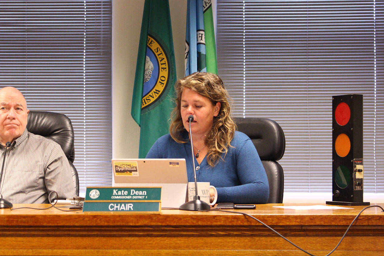 Jefferson County commissioners Chair Kate Dean, right, responds to public comment with District 2 Commissioner David Sullivan at their Monday morning meeting. (Zach Jablonski/Peninsula Daily News)