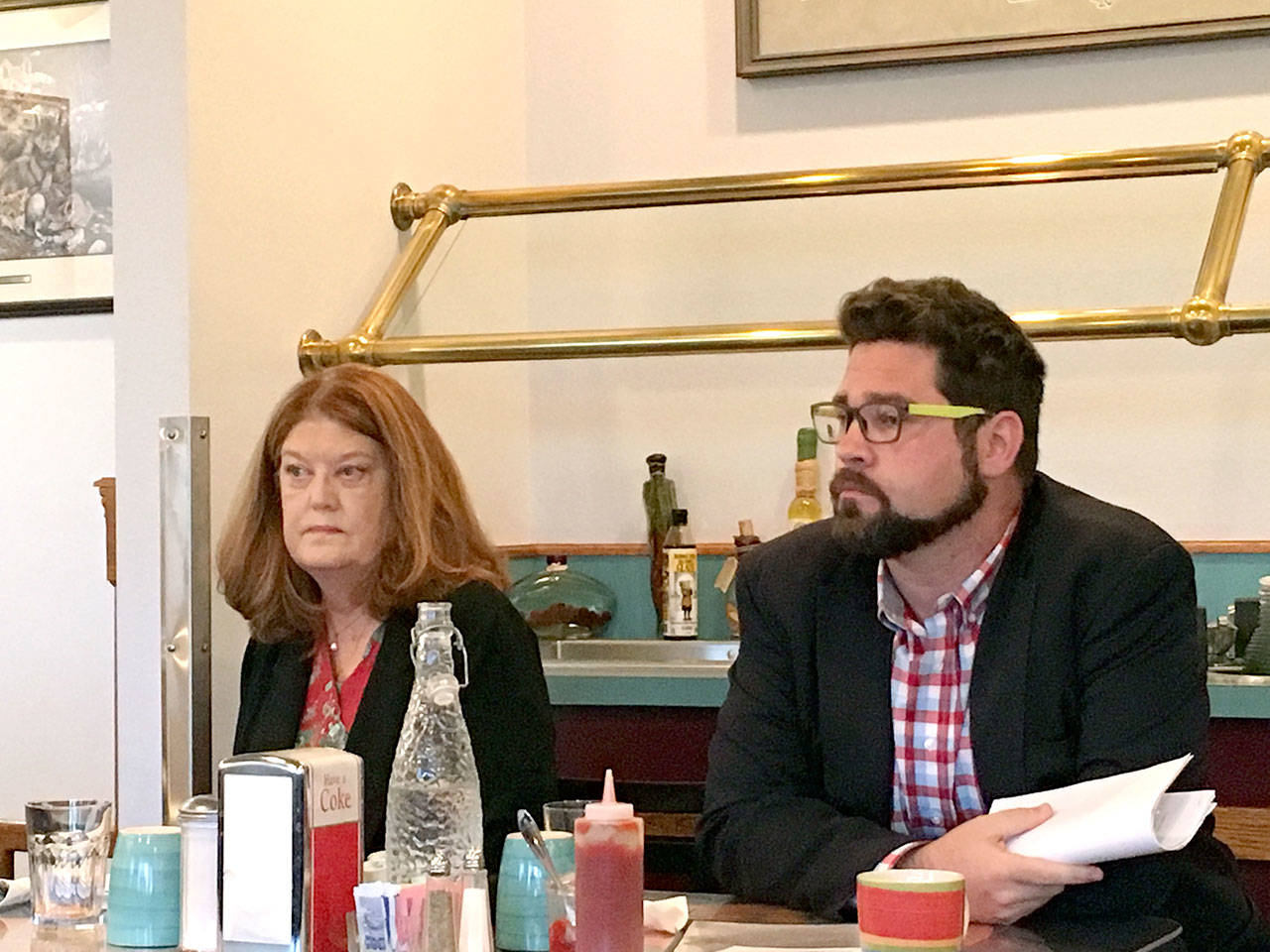 Port Angeles City Council candidates Martha Cunningham and Brendan Meyer are shown at a Port Angeles Business Association forum Tuesday at Joshua’s Restaurant. (Rob Ollikainen/Peninsula Daily News)