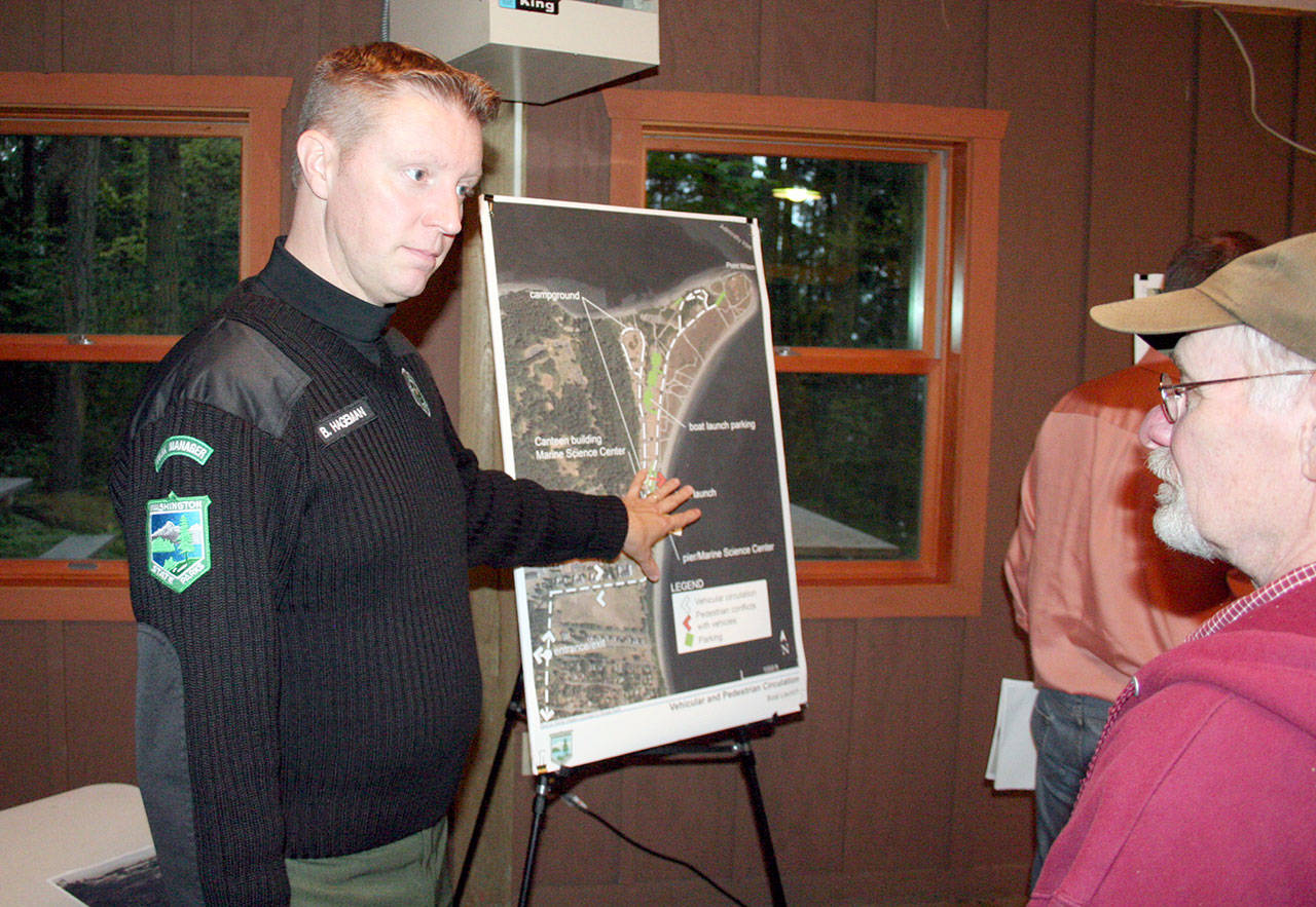 Brian Hageman, a parks ranger who manages Fort Worden-area state parks, talks about conflicts within the current traffic pattern near the boat launch. He said those who use the launch generally aren’t there during the peak activity periods at the park. (Brian McLean/Peninsula Daily News)