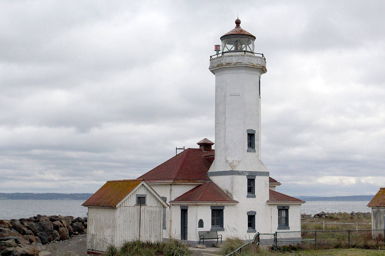Point Wilson Lighthouse has been a landmark in Jefferson County since the 1800s, and now after leasing the property from the Coast Guard, the U.S. Lighthouse Society hopes to restore it so the public can learn about its history. (Zach Jablonski/Peninsula Daily News)