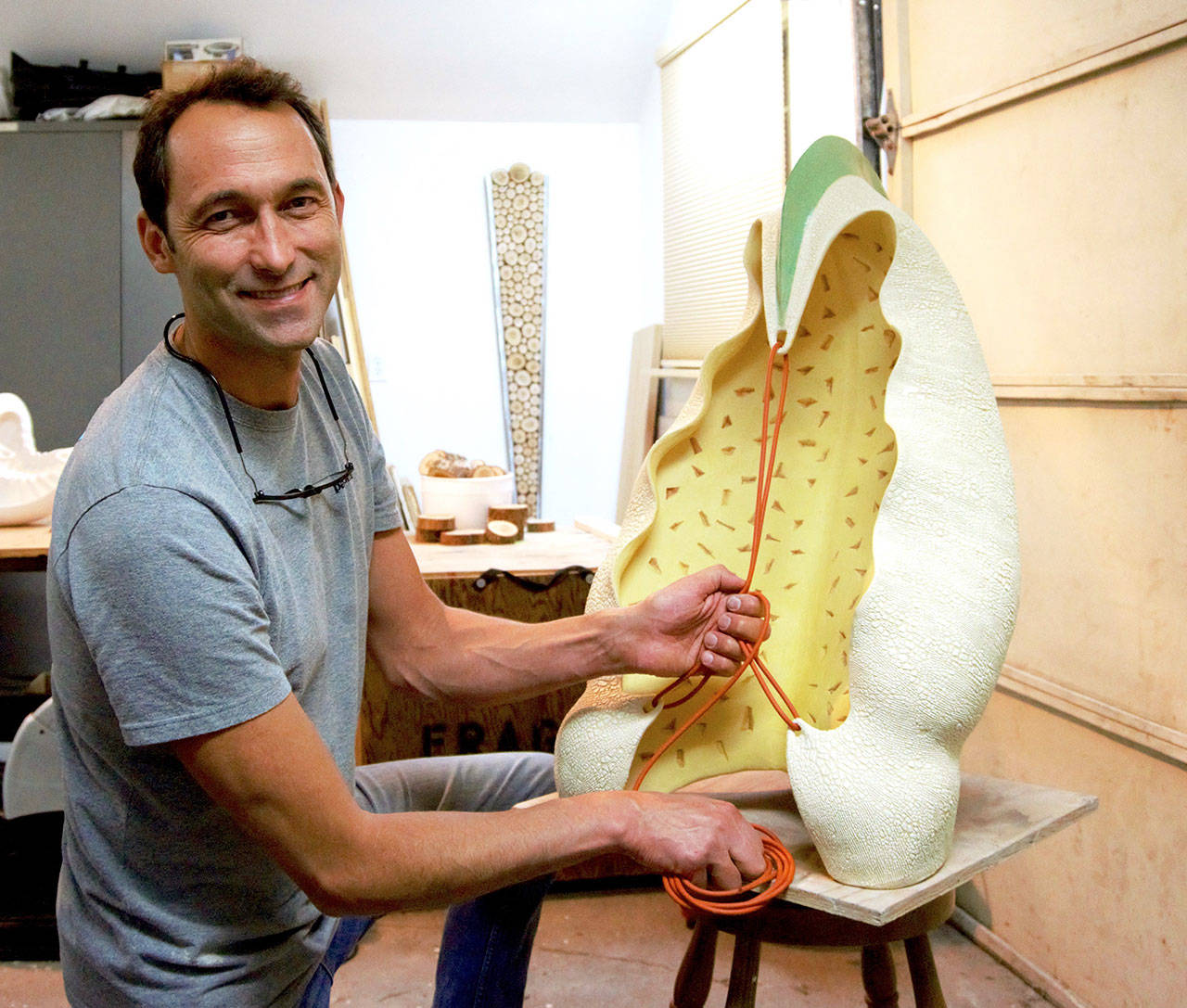 Sculptor Steve Belz works in his Port Angeles studio. His show, Taking It In, opens Saturday at the Port Angeles Fine Arts Center.