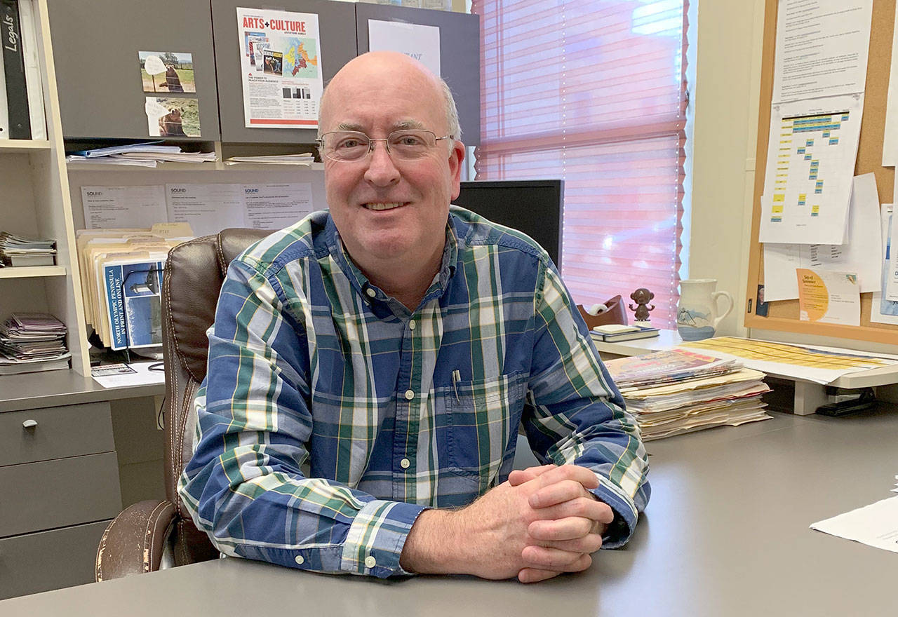 Steve Perry, the general manager and advertising director of the Olympic Peninsula News Group and the Kitsap News Group, will say goodbye to his office at the Peninsula Daily News at the end of the month. (Kelley Lane/Peninsula Daily News)