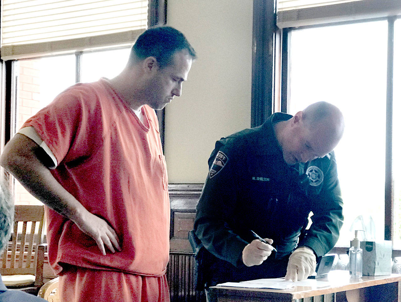 Charles Carroll Hartzell IV, left, has been sentenced to five years in prison after a plea deal on charges that related to a 2017 incident in which he led a Jefferson County Sheriff’s deputy on a chase from Chimacum to Port Hadlock. The case had been returned from the Court of Appeals. (Brian McLean/Peninsula Daily News)