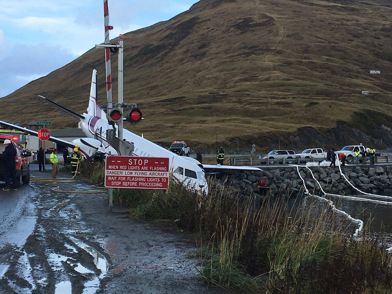 A commuter airplane crashed near the airport in a small Alaska community on the Bering Sea on Thursday in Unalaska, Alaska. (Jim Paulin via AP)