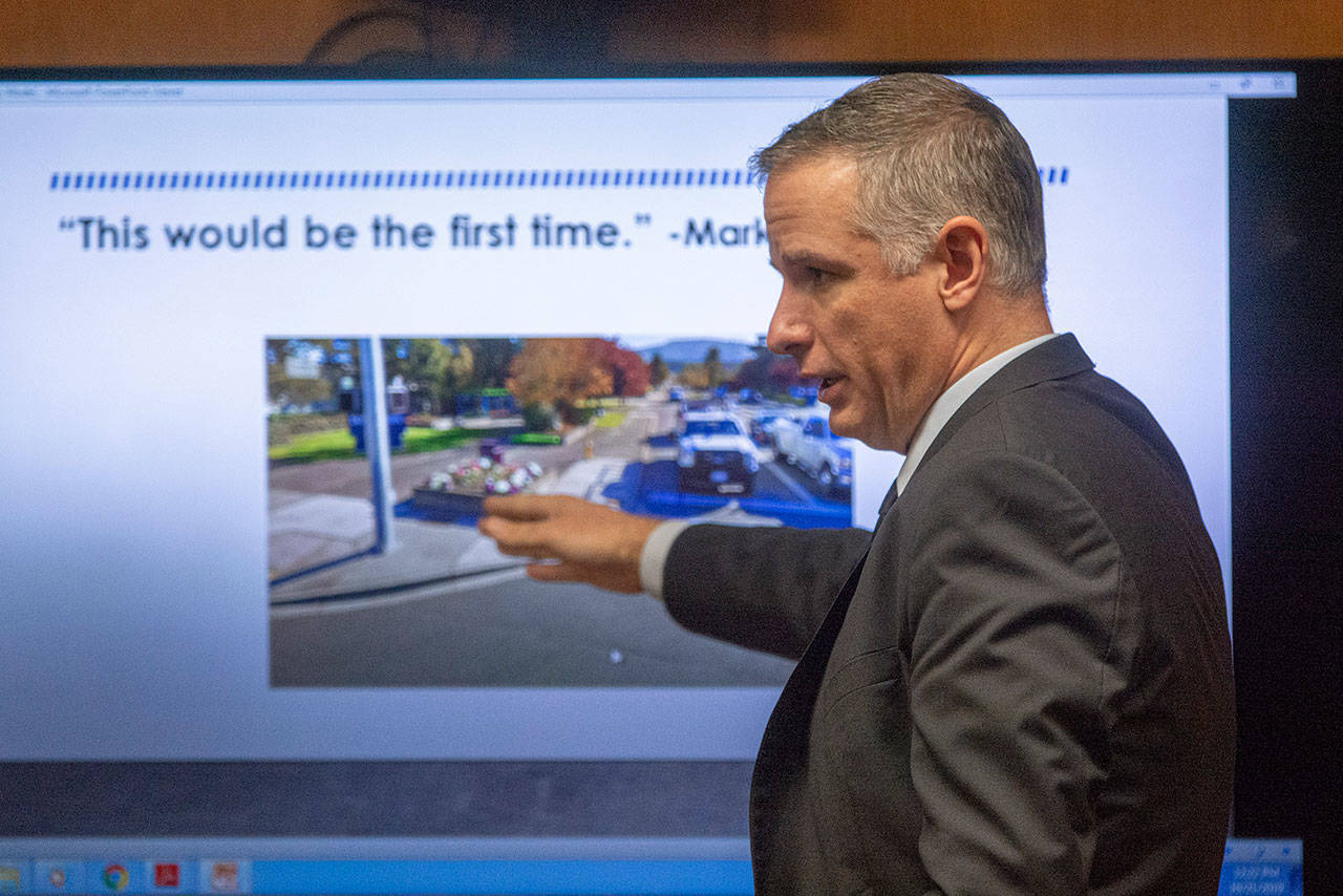 Michael Sanders, representing Clallam Transit System, tells jurors this is the first case of anyone falling over a Clallam Transit System tree box while listing other similar examples across Clallam County. (Jesse Major/Peninsula Daily News)