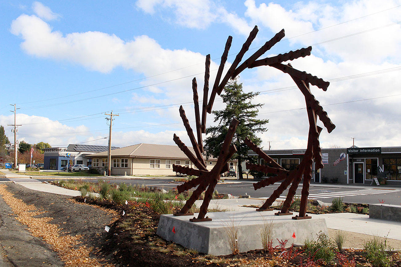 Grand opening, ribbon-cutting for sculpture