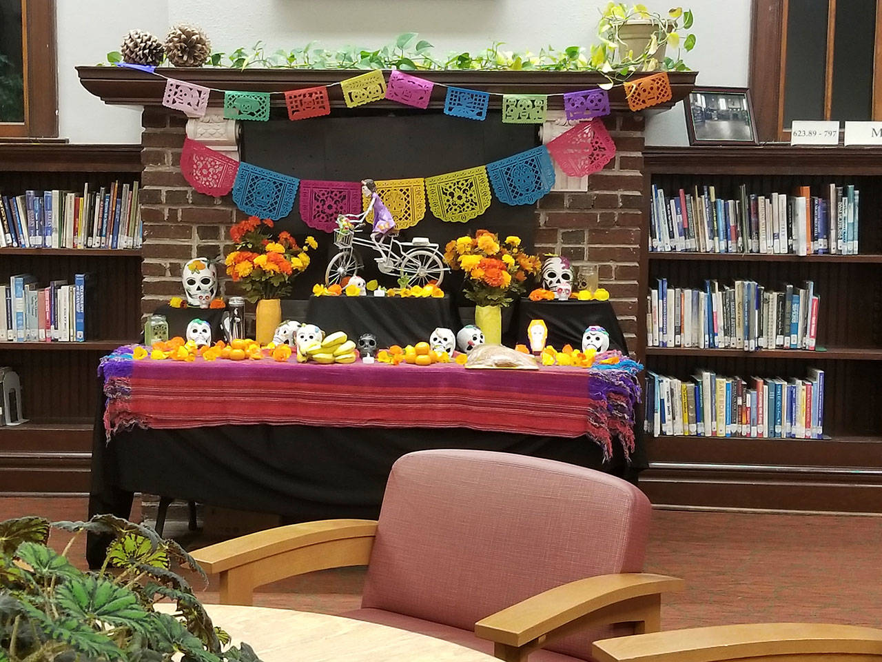 An altar is set up at the Port Townsend Library in 2018 during a Day of the Dead celebration. (Port Townsend Library)