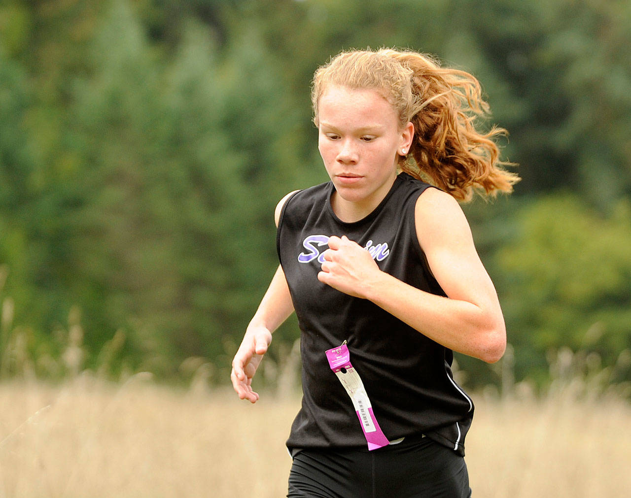 Sequim’s Riley Pyeatt, here running at the Olympic League 2A meet in late October,which she won, is looking to place at the 2A state meet Saturday. (Michael Dashiell/Olympic Peninsula News Group)
