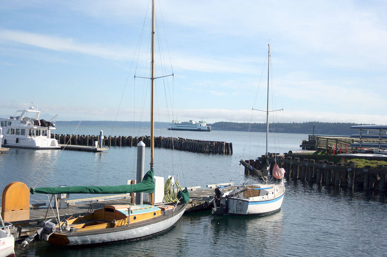 A state ferry passes by Point Hudson on Wednesday. Preliminary election results show the Port of Port Townsends Industrial Development District levy passing with an approval rate of nearly 53 percent. Point Hudson is among the sites, which also include the Herb Beck Marina in Quilcene, that would benefit from the $15 million levy. (Brian McLean/Peninsula Daily News)