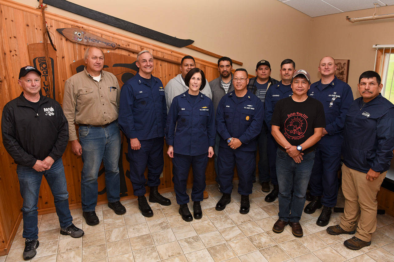 The members of the Quileute Tribe and Coast Guard included, from left, back row, Frank Geyer, Quileute Nation natural resource director; Larry Burtness, interim general manager; Vogt; Doug Woodruff Jr., Quileute Tribal Council chairman; Zack Jones, Quileute Tribal Nation vice chair; Skyler Foster, Quileute Tribal Council member; Petty Officer Jeremie Kozakiewicz, engineering petty officer at Station Quillayute River; Senior Chief Michael Carola, officer in charge at Station Quillayute River; and Tony Foster, Quileute Tribal Council member and, front row, Dean; Wong and James Jackson Sr., treasurer. (Petty Officer Steve Strohmaier)