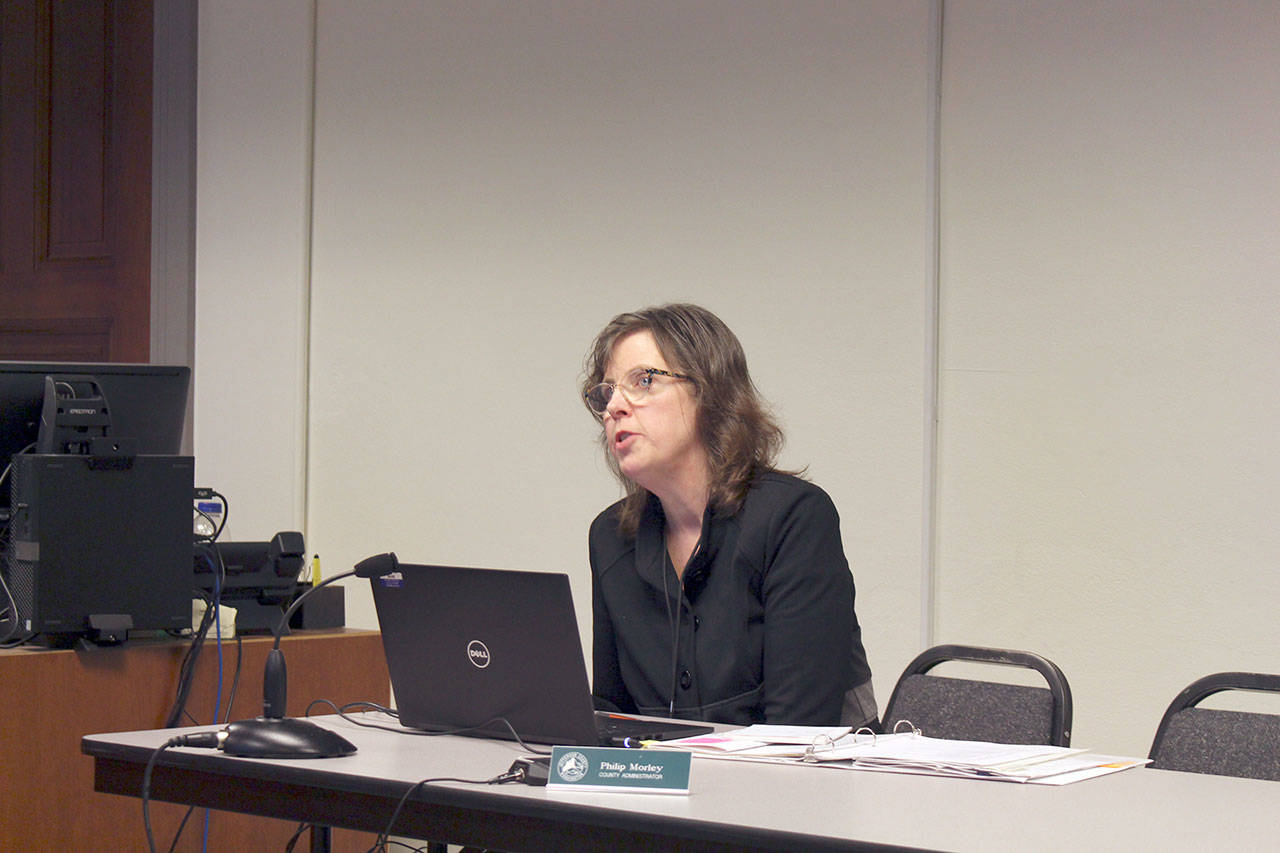 Wendy Clark-Getzin, transportation planner for Jefferson County Public Works, presents the six-year Transportation Improvement Plan to the Jefferson County commissioners Tuesday morning at the Jefferson County Courthouse. (Zach Jablonski/Peninsula Daily News)