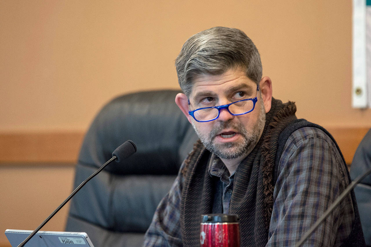 Clallam County Commissioner Mark Ozias talks about Conservation Futures before commissioners approve the property tax in a 2-to-1 vote Tuesday. (Jesse Major/Peninsula Daily News)