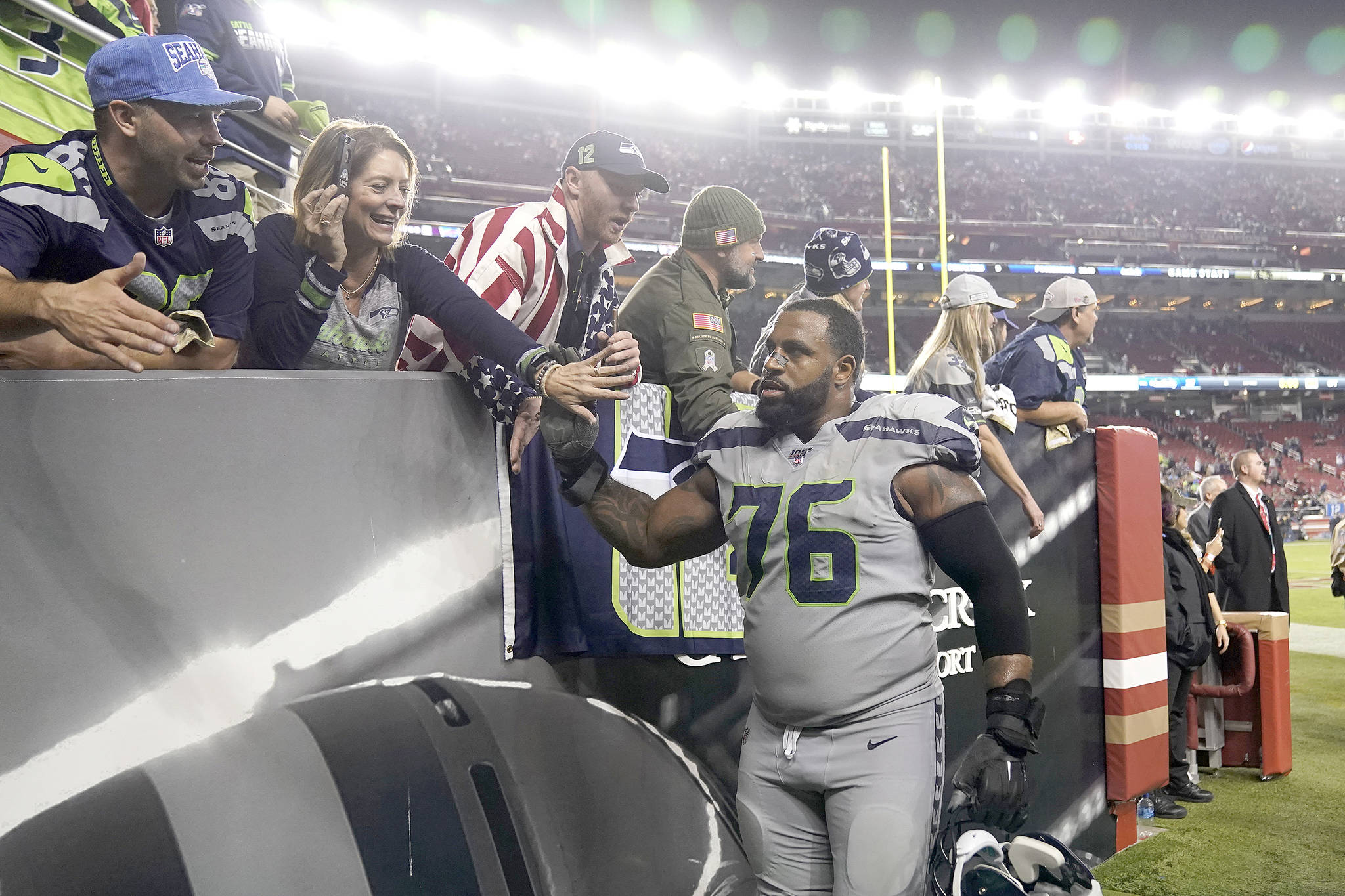 Seattle lineman Duane Brown greets fans after the Seahawks defeated San Francisco last month to improve to 6-0 on the road. (The Associated Press)