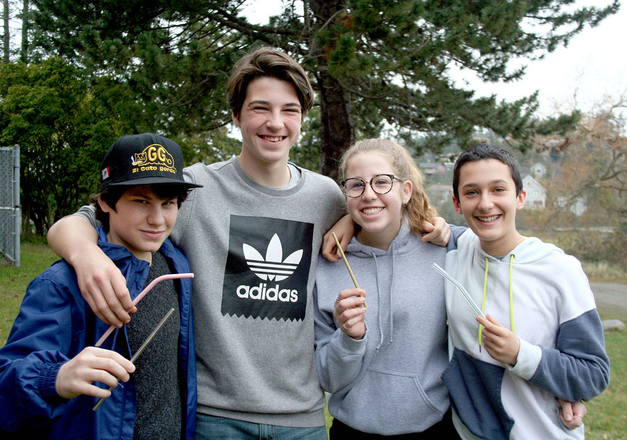 From left, Oscar Levine, Lochlan Krupa, Melanie Bakin and Anna Molotsky are part of the Students for Sustainability club at Port Townsend High School. The club made a formal presentation in front of the Port Townsend City Council this month to propose a citywide ban on plastic straws. (Brian McLean/Peninsula Daily News)