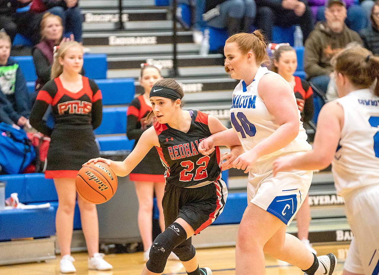 Steve Mullensky/for Peninsula Daily News Port Townsends So-So Johnston dribbles past Chimacums Amiyah Fisher during a Wednesday game in Chimacum.