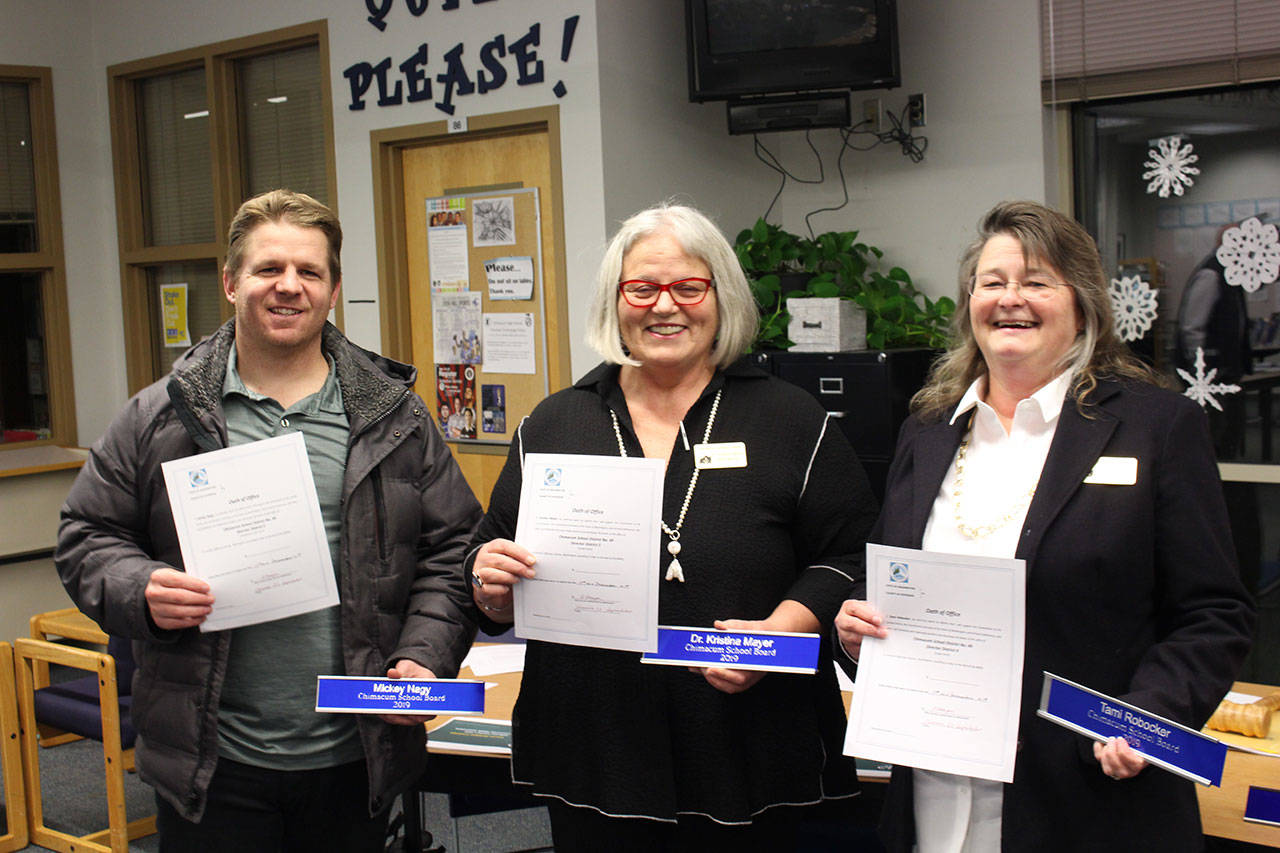 The Chimacum School Board gained three new members after Superintendent Rick Thompson swore in the new Director of District 2 Mickey Nagey, left, Director of District 3 Kristina Mayer and Director of District 4 Tami Robocker. (Zach Jablonski/Peninsula Daily News)