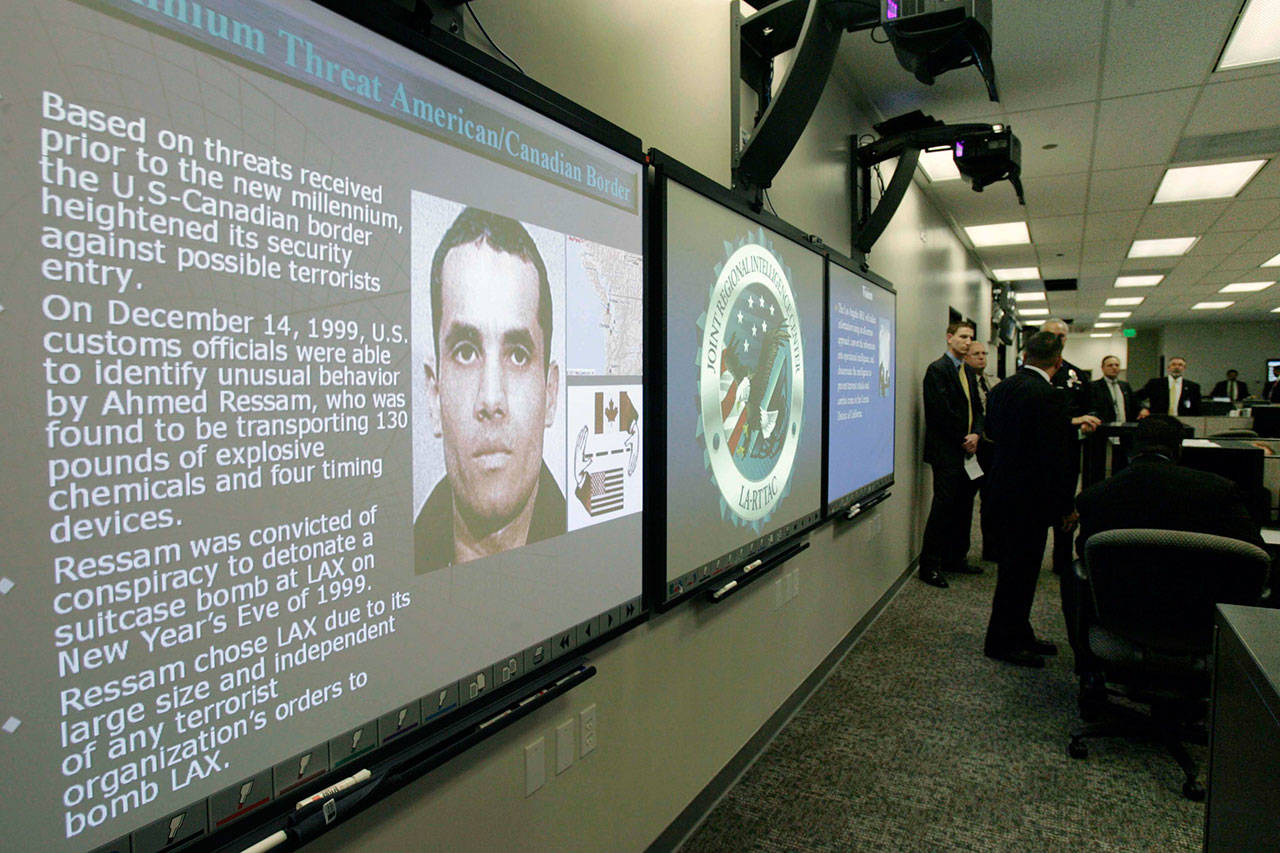 Known terrorist Ahmed Ressam is displayed on a giant monitor at the Los Angeles Joint Regional Intelligence Center in Norwalk, Calif. on July 27, 2006. (Nick Ut/The Associated Press, file)