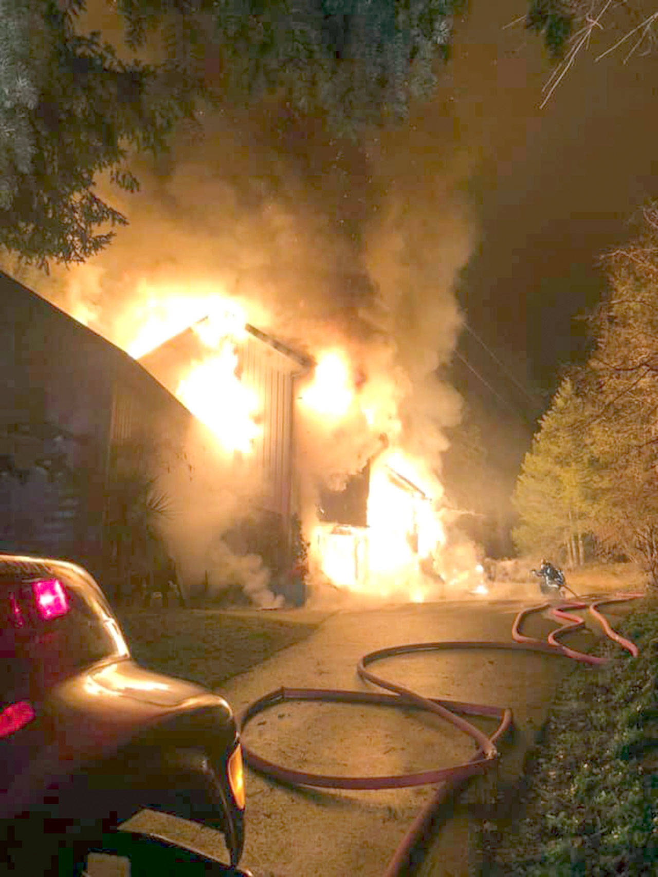 One of the two occupants of a three-story home near Brinnon was found dead inside after a fire early Tuesday, Brinnon Fire Chief Tim Manly said. (Brinnon Fire Department)