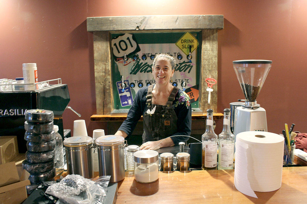 Discovery Bay Village Store and Detour owner Stacey Brotherton stands behind the bar of the Detour, which she is renovating to be used to serve coffee. The Detour Bar closed at the end of September. (Zach Jablonski/Peninsula Daily News)