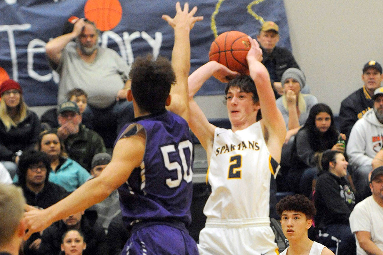 FORKS BASKETBALL Tough night at the office for Spartans in