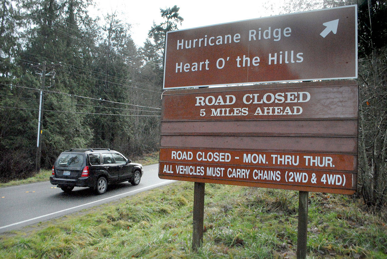 An information sign at the Olympic National Park visitor center indicates the closure of Hurricane Ridge Road on Saturday because of winter conditions. (Keith Thorpe/Peninsula Daily News)