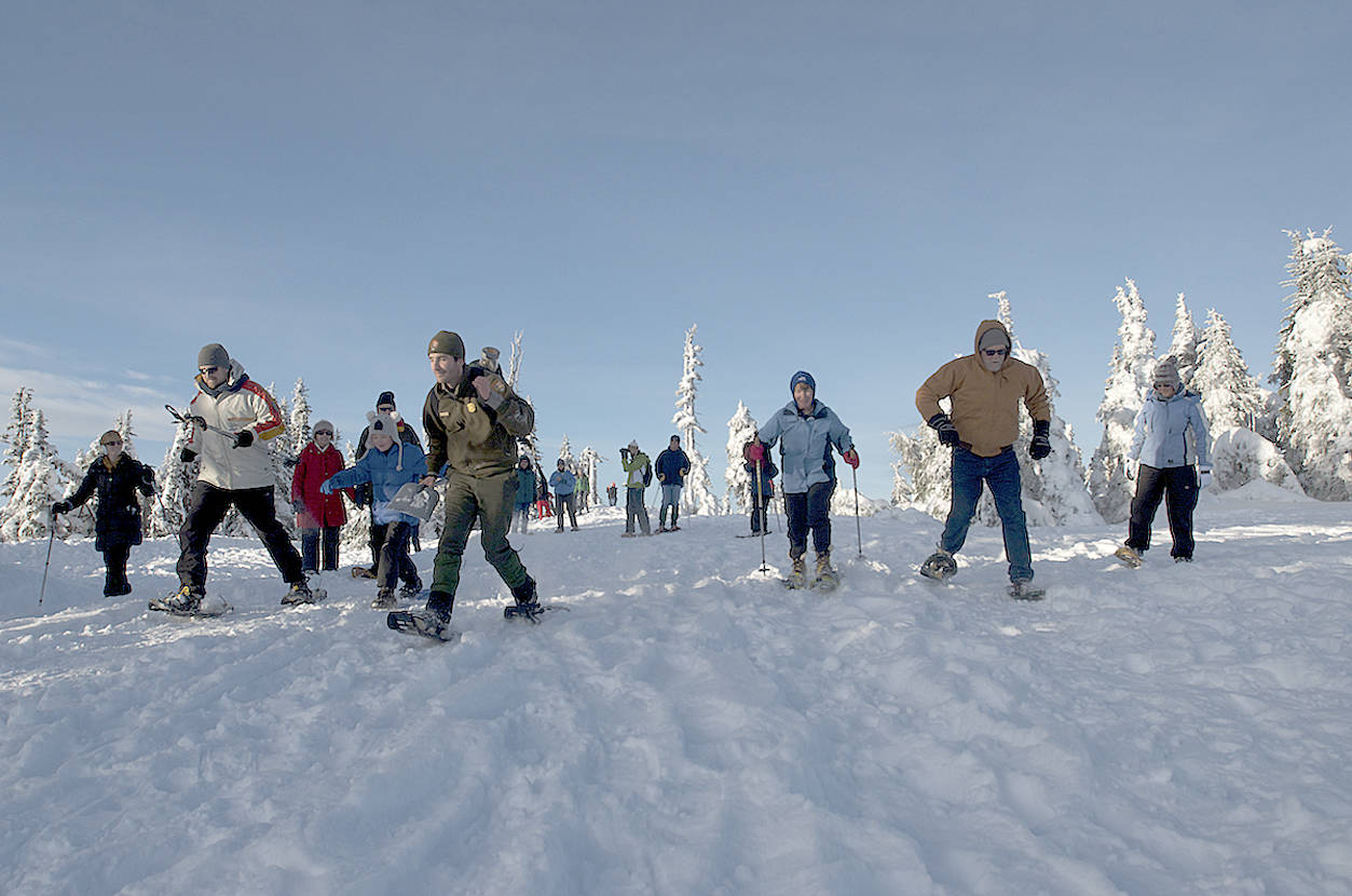 Through the end of March 2019, snow permitting, families can join a ranger-guided snowshoe walk at Hurricane Ridge. Walks are offered at 2 p.m. weekends and holiday Mondays. The walk lasts 1.5 hours and covers less than a mile. Snowshoes and instructions are provided. (Michael Dashiell/Olympic Peninsula News Group)