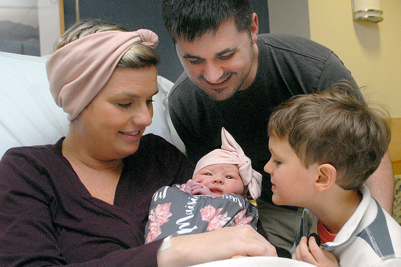 New Year’s baby: Coast Guard family welcomes baby girl