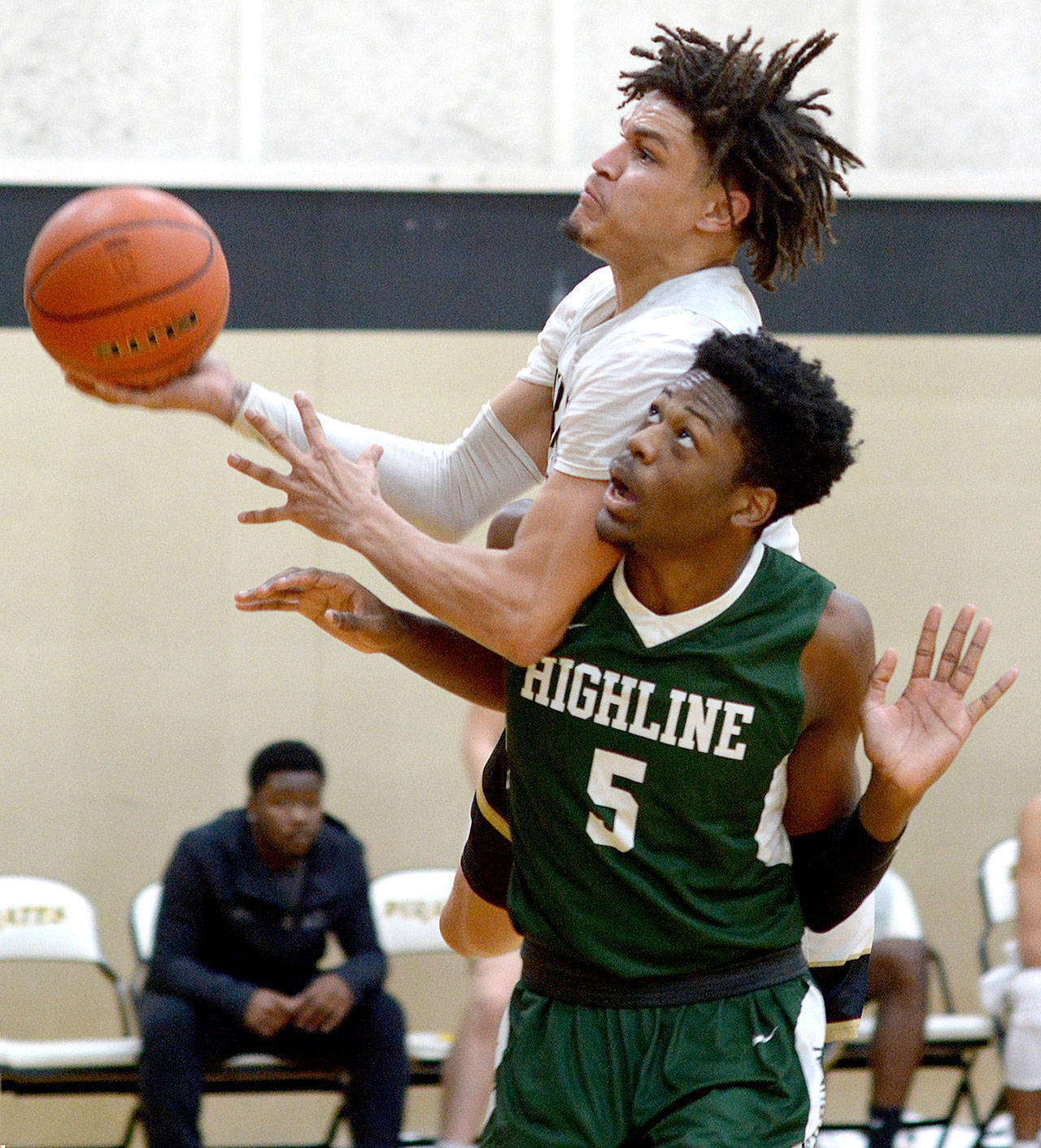 Peninsula’s Jaylin Reed goes up for a shot against Highline on Saturday. Reed scored 18 points to lead the Pirates in a 75-61 win. (Peninsula College)