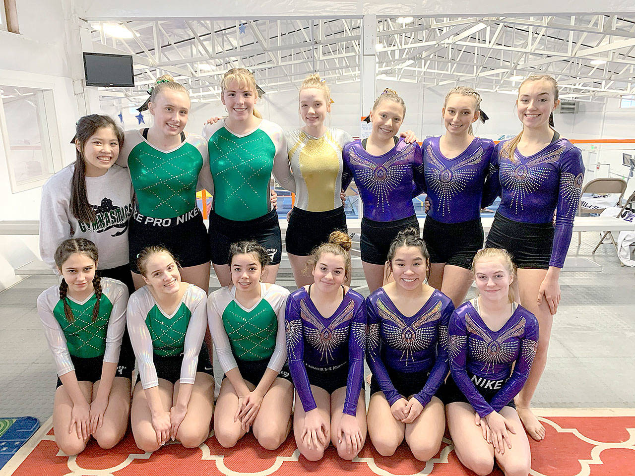 The Port Angeles/Sequim/Crescent combined gymnastics team competed this weekend at the Sehome Invitational in Bellingham. From left, back row, are team members Mei Ying Harper-Smith (manager), Maizie Tucker, Aiesha LaTourette, Aubrie Scott (Crescent), Ellie Turner, Emma Sharp and Gracie Sharp. From left, front row, are Samantha Aranda, Molly Scofield, Estrella Wasankari, Lani Vig, Lease Pfeffer and Kori Miller.