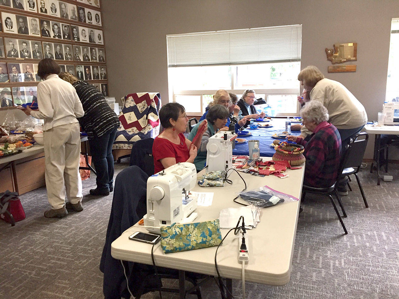 A group of quilters, including Susan Travis, Kathy Legarsky, Billie Carter, Ginny Moynihan and Connie Deckman, can be seen sewing for Jefferson County Quilts of Valor. (Chris Bates)