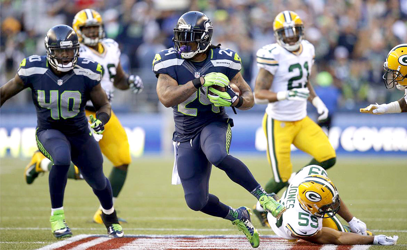 Marshawn Lynch of the Seattle Seahawks runs against the Green Bay Packers in Seattle in the NFC Championship game in January 2015. (The Associated Press)