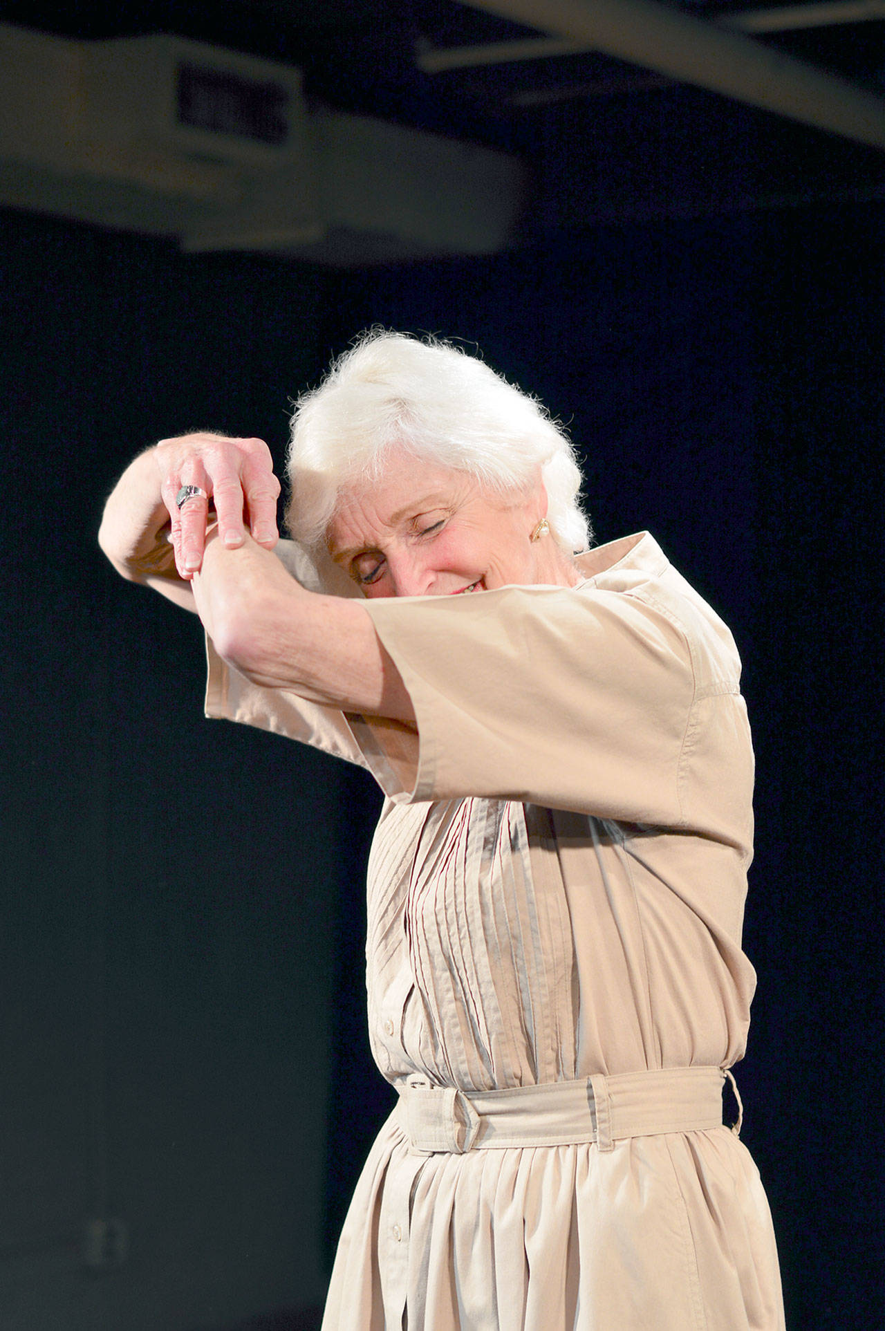 As Miss Lillian Carter, Carol Swarbrick Dries mimes dancing with her husband, Earl, in “Lillian Carter: A Life of Some Significance.” (Diane Urbani de la Paz/for Peninsula Daily News)