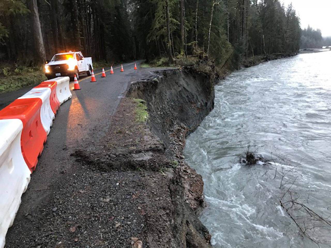 Jefferson County commissioners have declared a state of emergency for work on the Upper Hoh Road after a storm on Jan. 7 increased river flows and washed away a section of road that was 90 feet long by 20 feet wide. That portion of the roadway has been reduced to one lane. (Jefferson County Public Works Department)