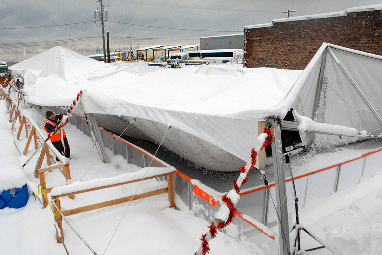 Heavy snow brings down Port Angeles Winter Ice Village tent