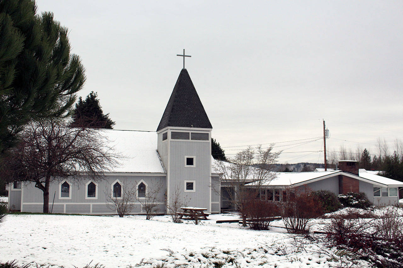 Snow blanketed the First Presbyterian Church in Quilcene on Wednesday after overnight snow Tuesday. (Zach Jablonski/Peninsula Daily News)