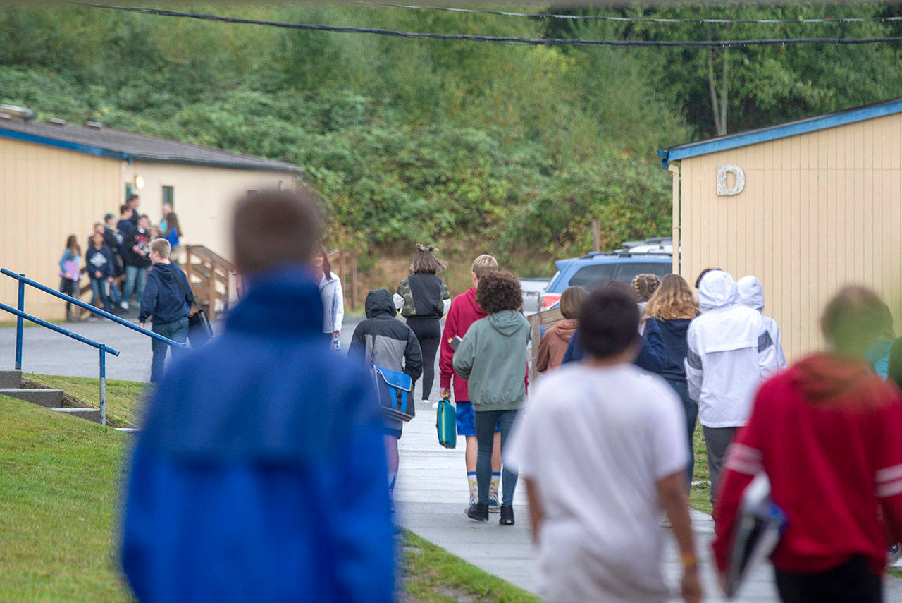 Students at Stevens Middle School in Port Angeles walk to and from classes in this file photo from Sept. 22, 2019. (Jesse Major/Peninsula Daily News file)
