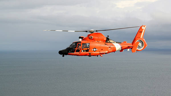 A Port Angeles Coast Guard helicopter crew came to the aid of a hiker near Neah Bay on Sunday. (U.S. Coast Guard)