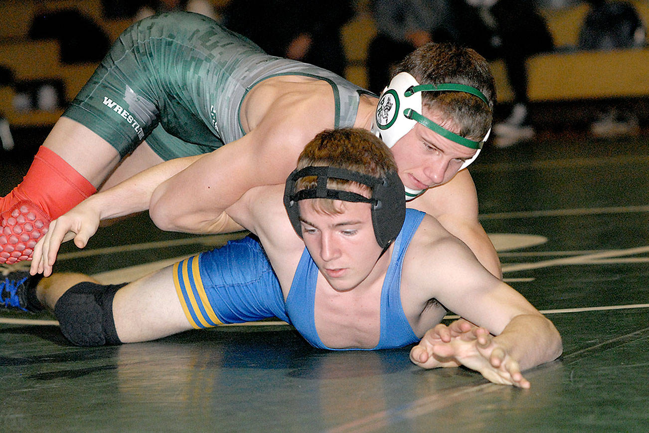 WRESTLING: Port Angeles grapplers pin down a win on senior night