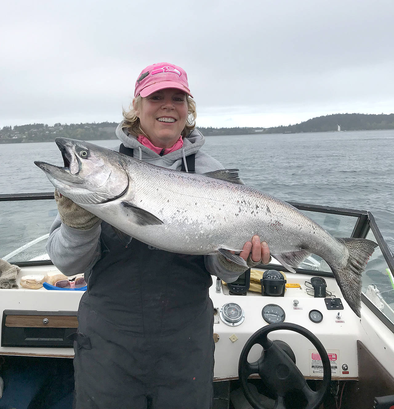 Brenda Burke and Kevin Meehan caught this 19.6-pound chinook while fishing off Port Townsend using a Silver Horde cop car lure in 130 feet of water during the 2018 blackmouth season.