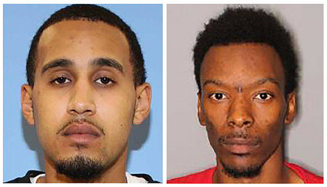 This combination of undated photos released by the Seattle Police Department shows Marquise Tolbert, left, and William Tolliver. The two men who investigators say were involved in a downtown Seattle shooting that killed one person and injured several others were arrested Saturday, the Seattle Police Department said. The Seattle Times and the Las Vegas Review-Journal report that Tolbert, 24, and Tolliver, 24, were booked into jail in Clark County, Nevada, according to jail records. (Seattle Police Department via The Associated Press)